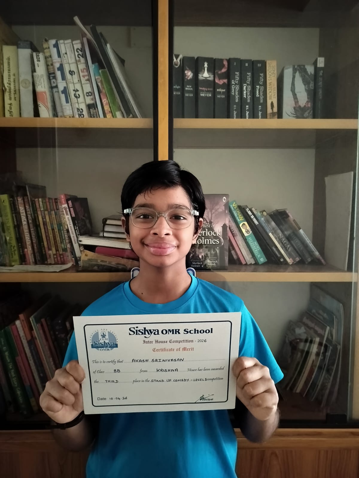 Akash with his stand-up comedy certificate