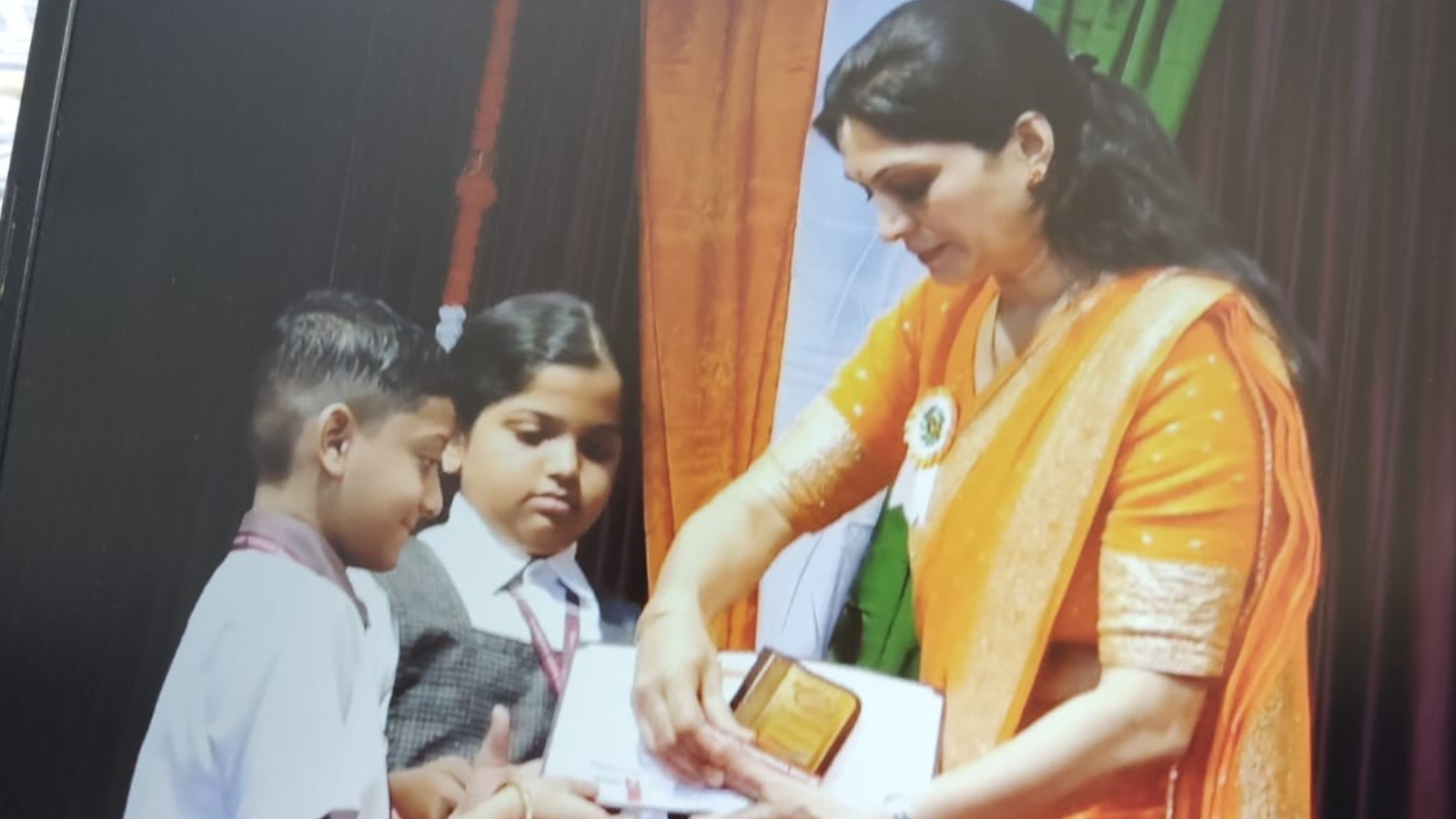 Daivik receiving his debate award